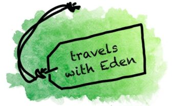 yellow travel changing mat travels with eden logo