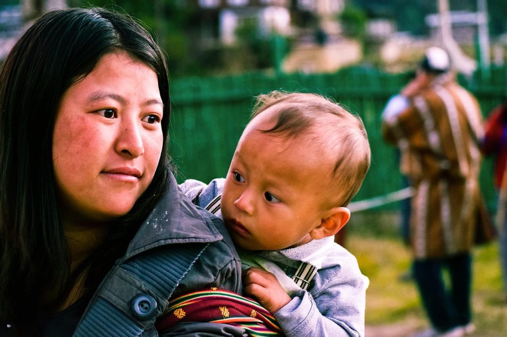 bhutanese woman with kid, bhutanese kid, small kid with mother-2725144.jpg